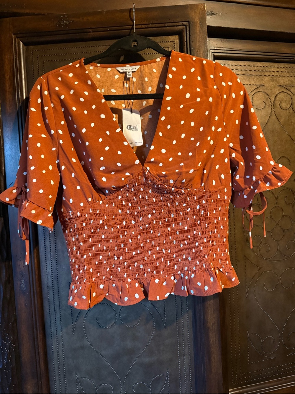 Naked Zebra Rust Polka Dot Smocked Peplum Top